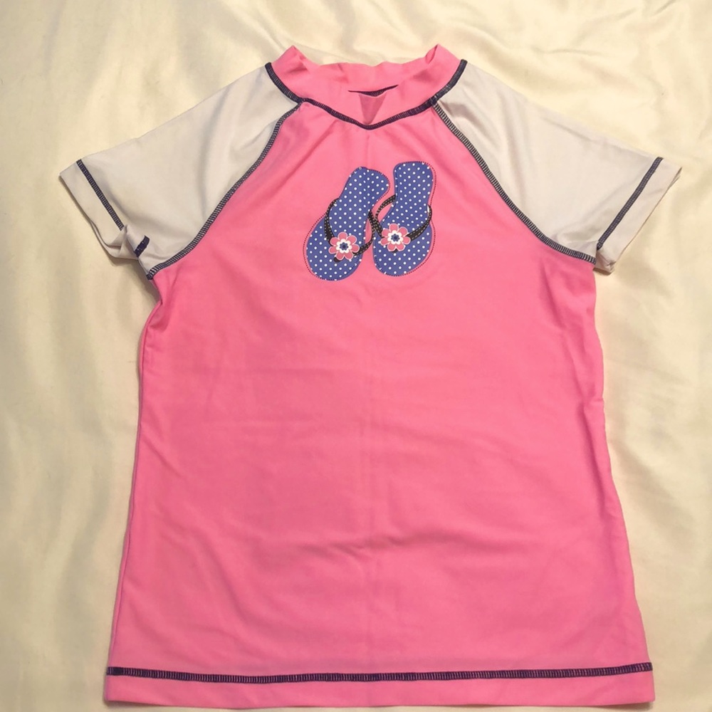 Pink and white girls rashguard